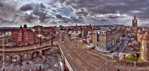 Panoramic landscape view of Newcastle upon Tyne's Central Station shot in HDR on an overcast summer daytime from the castle keep