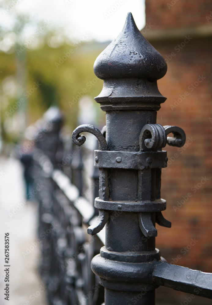 Fototapeta premium Ancient church exterior.Metal railing