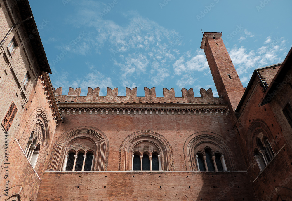 view of the Gothic palace (Palazzo Gotico) from courtyard - in the Main square of Piacenza on a sunny day - Emilia-Romagna