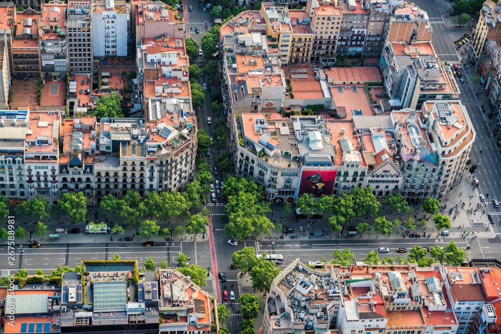 Aerial view of Barcelona buildings, high angle view of the city typical urban grid, Spain