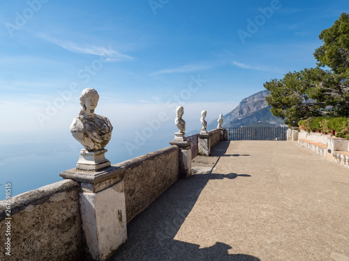 April, 2019: White statues decorate a Terrace of Infinity in Villa Cimbrone above the sea in Ravello, Amalfi Coast, Italy. photo