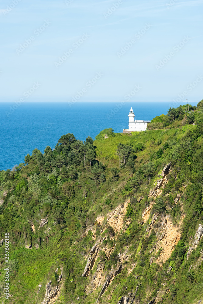 The lighthouse of Monte Igeldo in San Sebastian, Donostia, Basque Country of Spain. Vertical framing. 