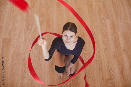 Εκτύπωση καμβά Directly above view of positive ambitious attractive female rhythmic dancer twir