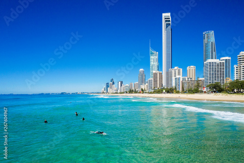 Surfers catching waves in Surfers Paradise on the Gold Coast
