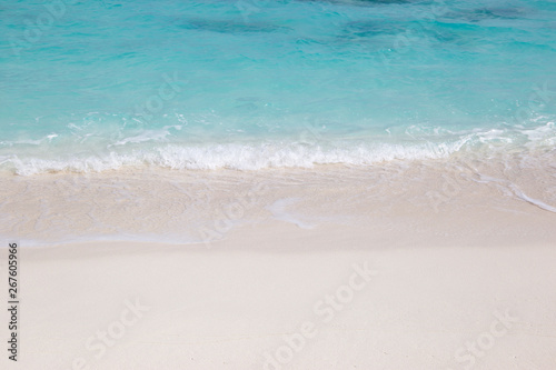 Beach surface texture background, turquoise ocean in the Maldives