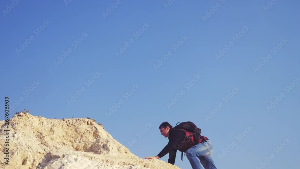 teamwork business travel silhouette concept. group of tourists climb the cliffs mountains. people climbers climb to the top overcoming hardships the path to lifestyle victory teamwork teamwork business travel silhouette concept. group of tourists climb the cliffs mountains. people climbers climb to the top overcoming hardships the path to lifestyle victory teamwork
