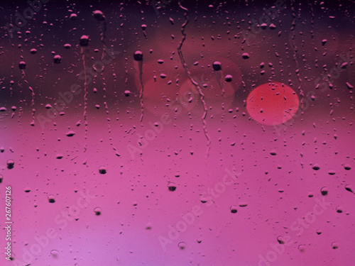 many drops in rain on light pink and dark pink background