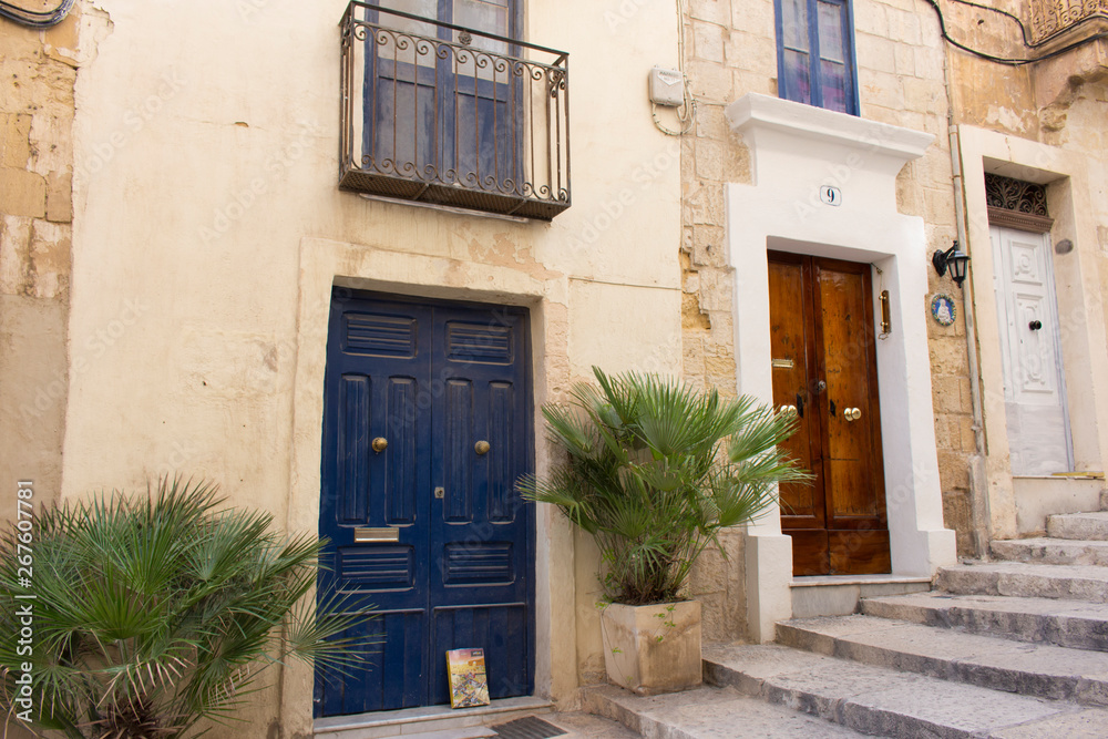 Typical old wooden doors in the streets of Valletta, Malta