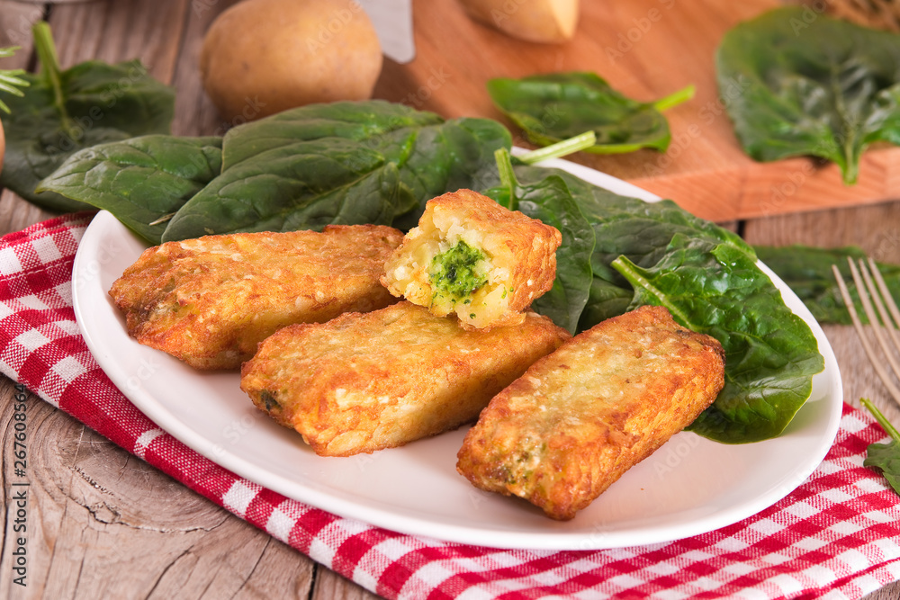 Potato croquettes with spinach and mozzarella. Potato croquettes with spinach and mozzarella.
