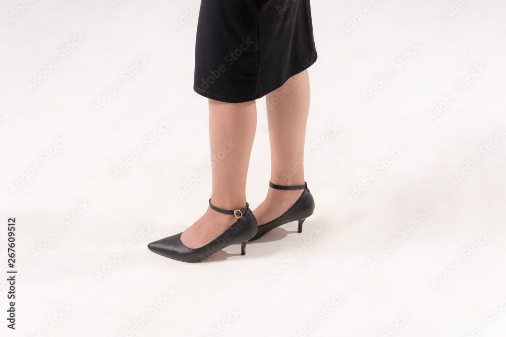 Elegant lady with beautiful legs in high heel shoes , Cheerful young woman with sexy legs and black skirt. Elegant lady with beautiful legs in high heel shoes , Cheerful young woman with sexy legs and black skirt.