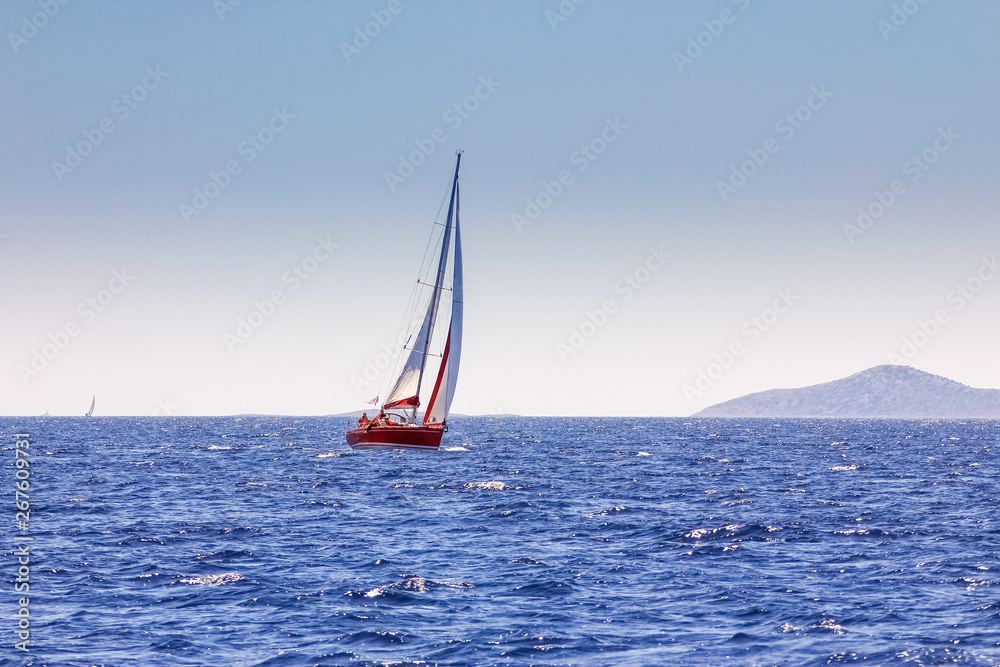 Fototapeta premium Red yacht at sea, regatta. Sailing