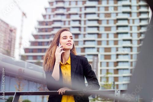 Businesswoman with a mobile...