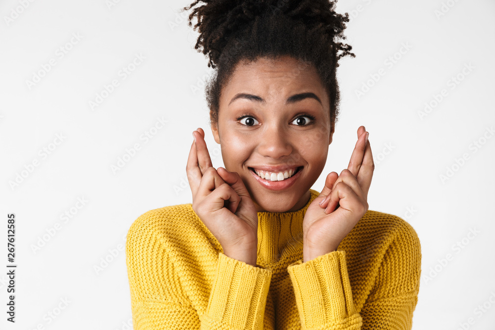 Emotional woman posing isolated over white wall background make hopeful please gesture.