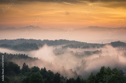 Foggy evening in Alps in Tunjice, Upper Carniola, Slovenia