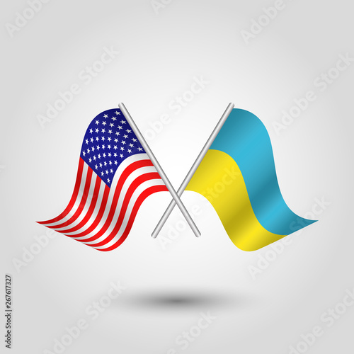 vector two crossed american and ukrainian flags on silver sticks - symbol of united states of america and ukraina