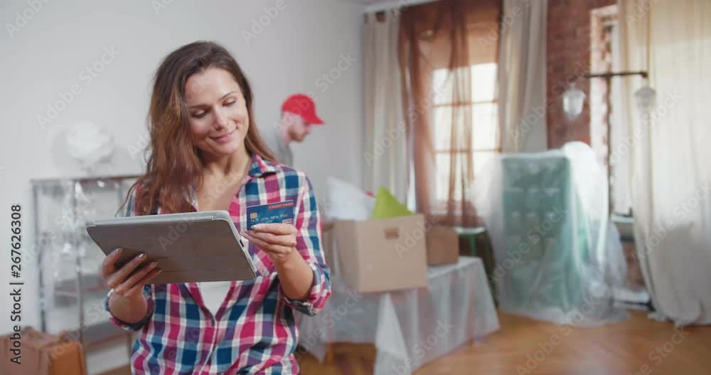 attractive woman do online shopping for moving attractive woman do online shopping for moving