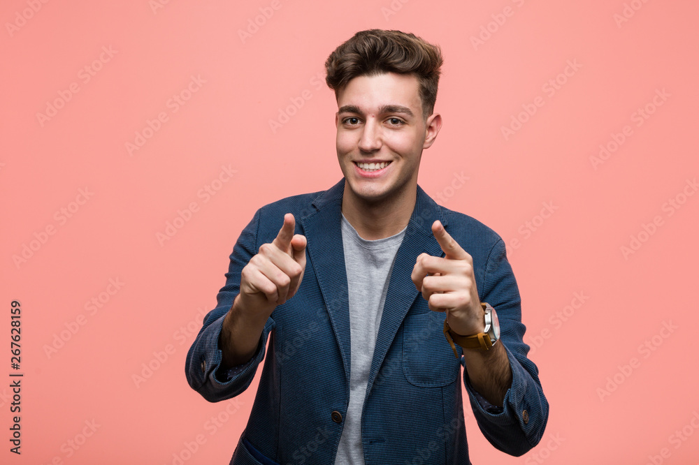 Young business natural man cheerful smiles pointing to front.