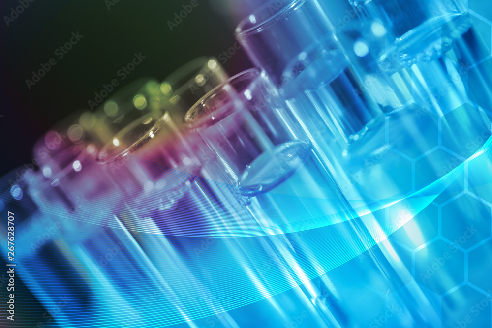 Test tubes on color background, closeup. Solution chemistry Test tubes on color background, closeup. Solution chemistry