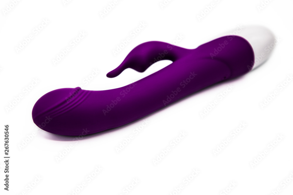 Sex toys. Purple vibrator isolated on white background Sex toys. Purple vibrator isolated on white background