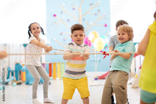 group of preschool kids pla...