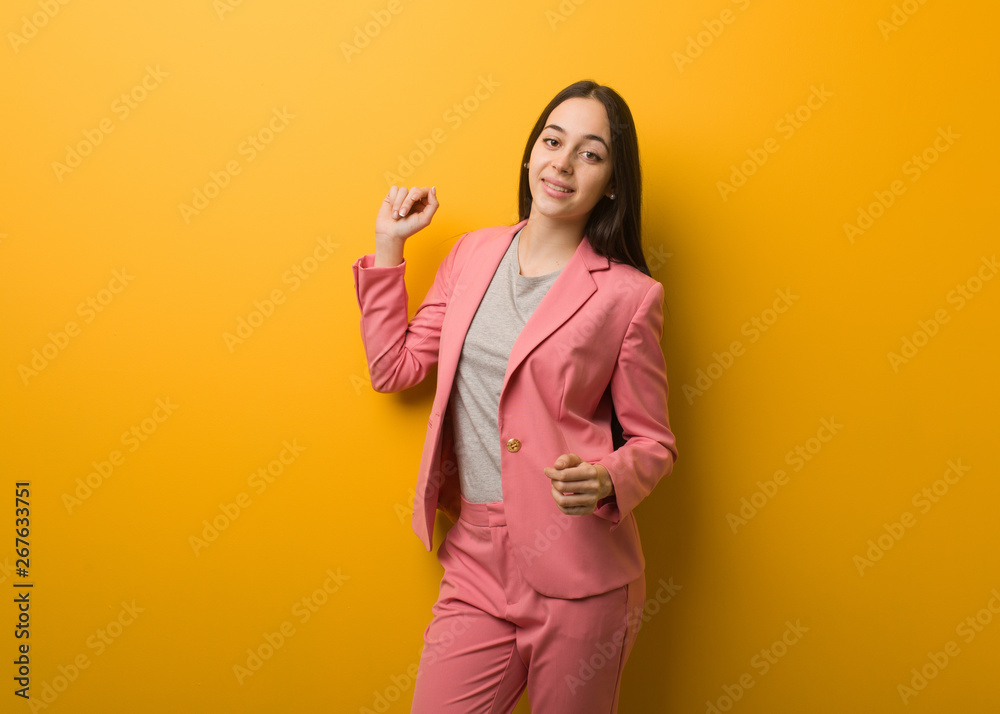 Young modern business woman dancing and having fun Young modern business woman dancing and having fun