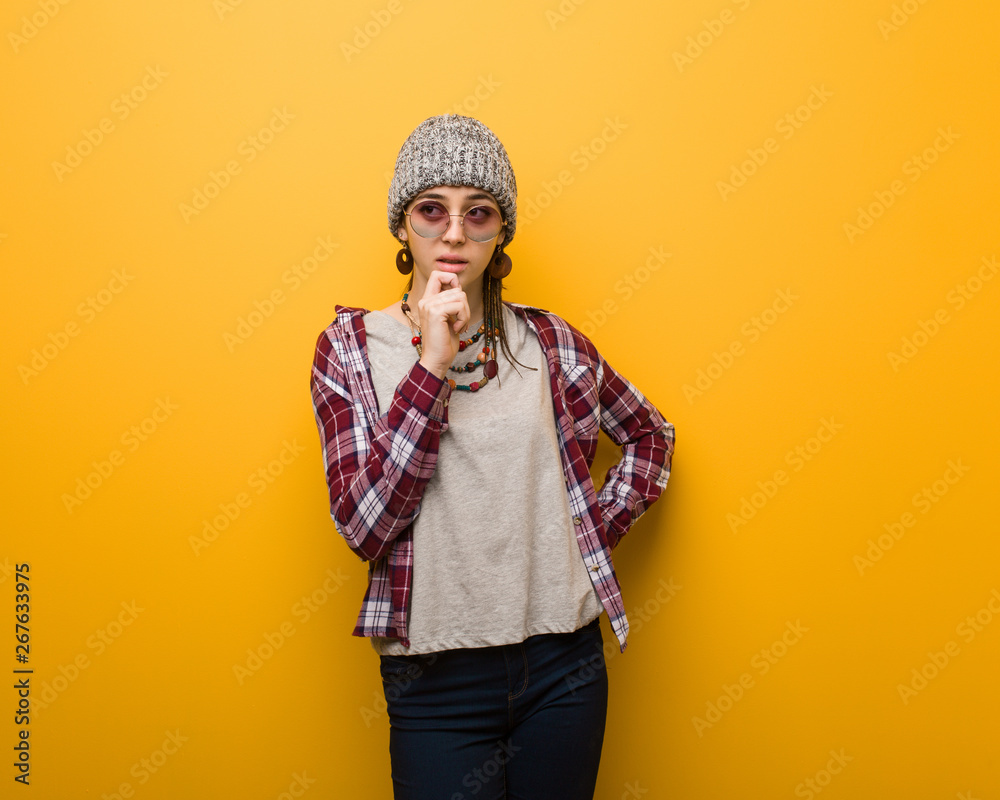 Young hippie natural woman doubting and confused Young hippie natural woman doubting and confused