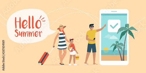 Happy family booking a summer vacation online