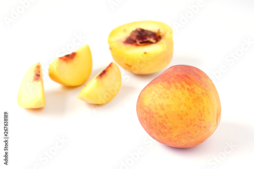 fresh peach fruit selective focus isolated on white background