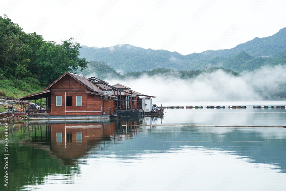 renovate, under construction wooden floating raft house resort by mountain Kanchanaburi Thailand