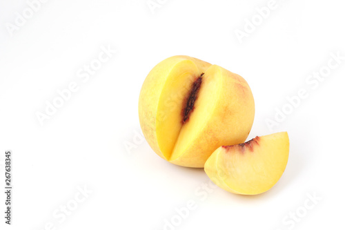 Fresh peach fruit slice isolated on white background