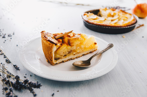 Piece of apple pie on plate photo