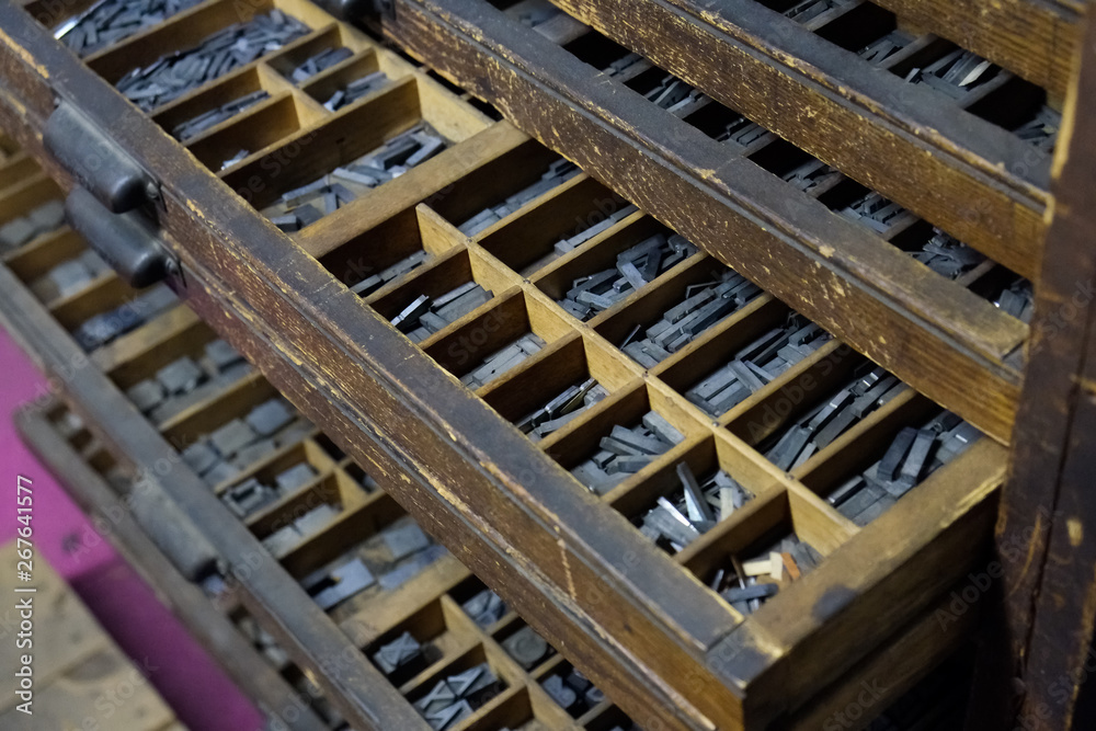 Old wood press printing shop. Case full of letters Old wood press printing shop. Case full of letters