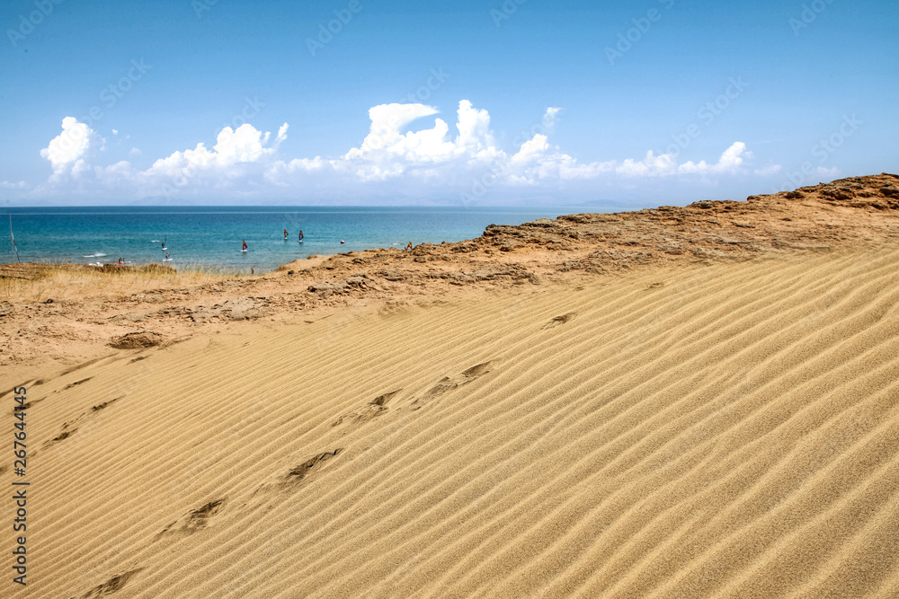 Beach background of free space and summer day. Hot yellow sand and blue sky. Beach background of free space and summer day. Hot yellow sand and blue sky.