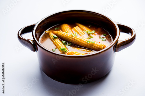 Baby Corn Manchurian with gravy - popular Indo-chinese recipe. selective focus