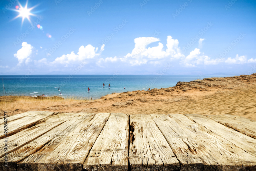 Summer day and wooden table background of free space. 