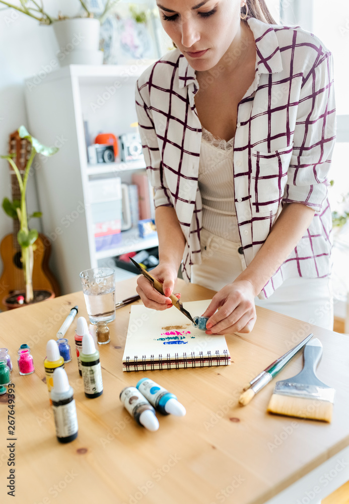 Woman Applying Color Pigments At Coloring Book Stock Photo 