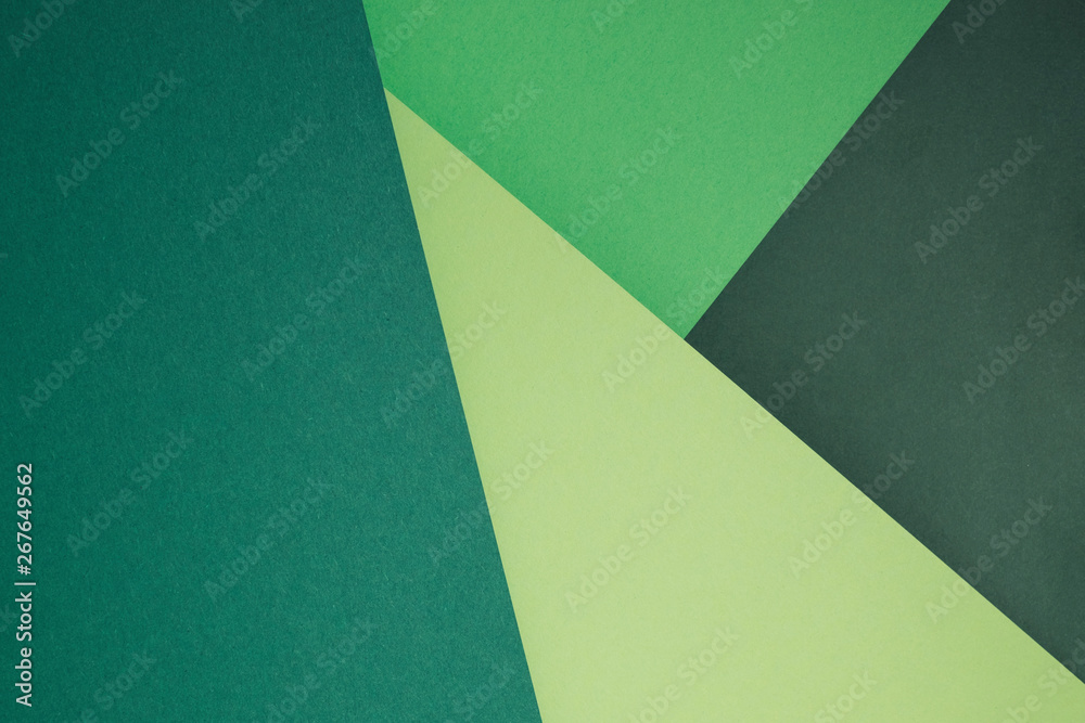 Green set of paper as an abstract background Green set of paper as an abstract background
