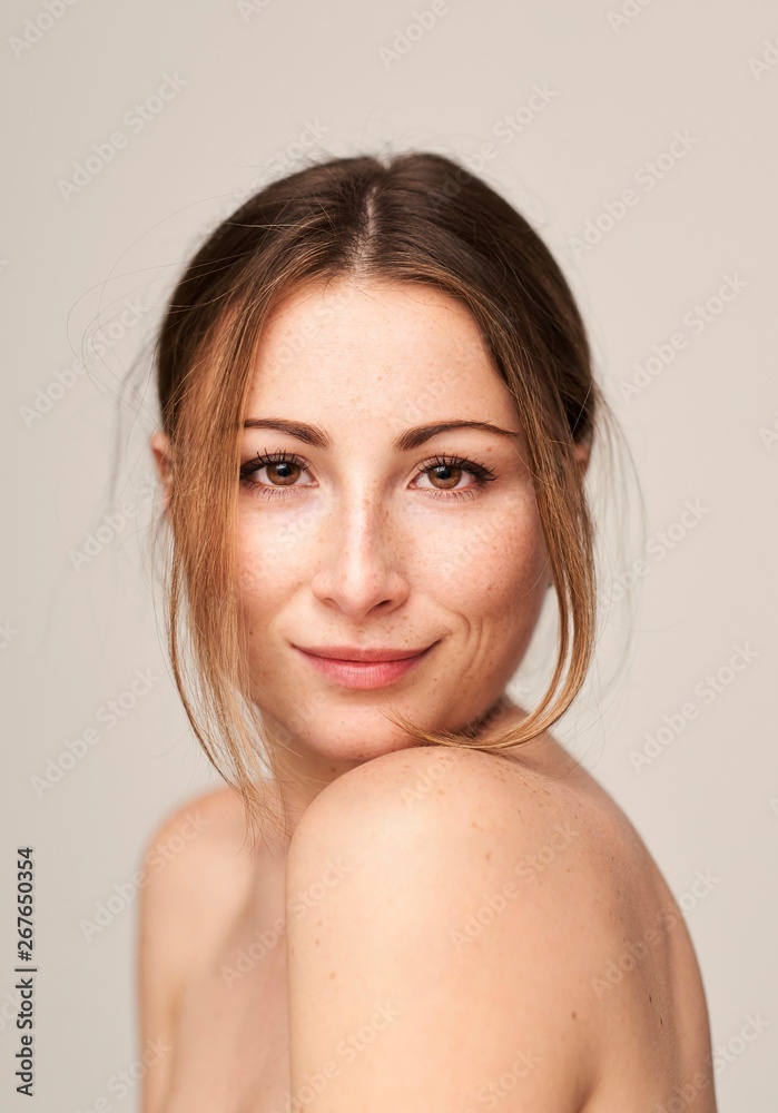 Portrait of beautiful young woman with freckles Portrait of beautiful young woman with freckles