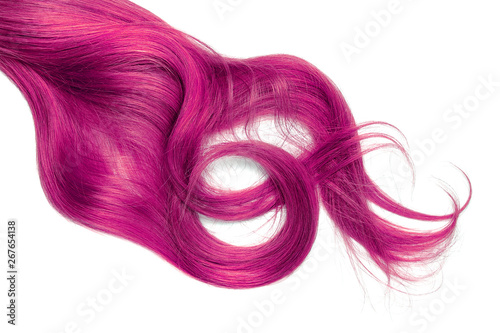 Disheveled pink hair isolated on white background. Long wavy ponytail