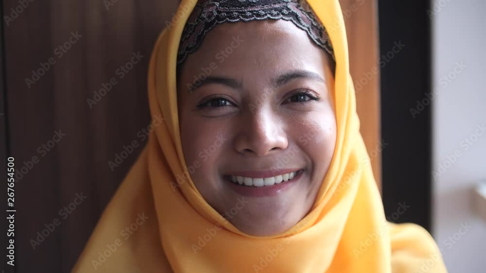 Asian Muslim woman in cafe Asian Muslim woman in cafe