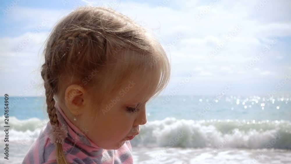 Beautiful girl blonde near the sea portrait Beautiful girl blonde near the sea portrait