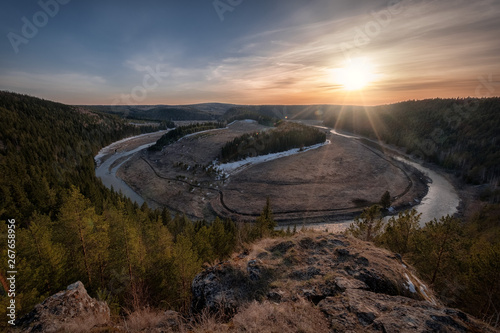 Sunset Loop of Irgina RIver. View from Vakutin stone to sunset. Perm region. photo