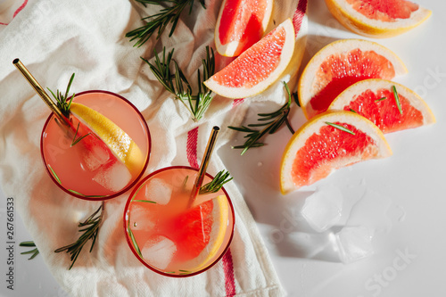 Homemade Cocktail making. Grapefruit and Rosemary cocktail.  Refreshing and non-alcoholic drink perfect for spring or summer. photo