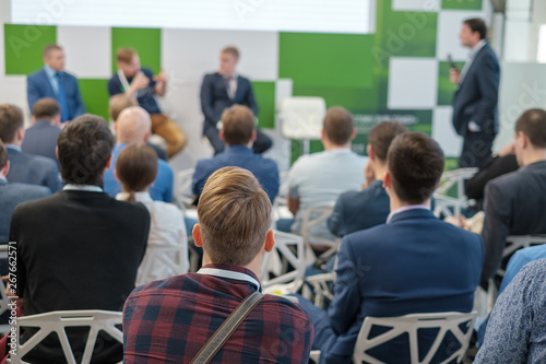 Audience listens to the lecturer at the conference