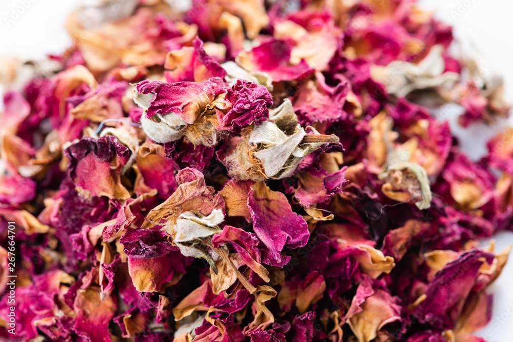Close-up, rose flower dry tea on white background Close-up, rose flower dry tea on white background