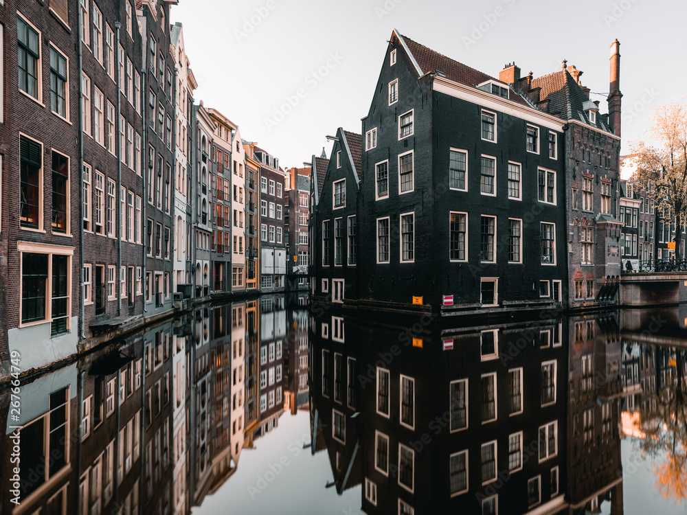 Canal and old houses in Amsterdam, Netherlands.