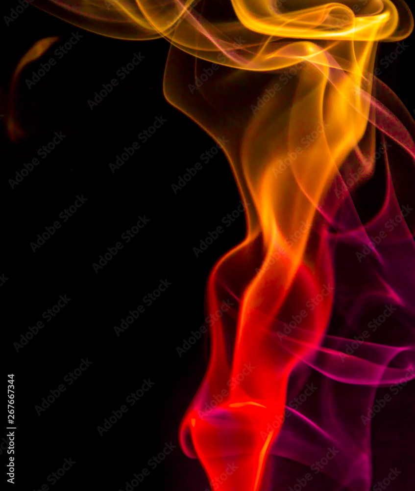 Colored smoke on black background Colored smoke on black background