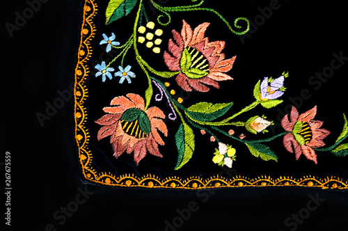 old Ukrainian embroidery in ornaments and patterns embroidered on a canvas