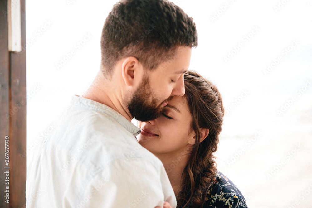Beautiful couple kissing and touching each other Beautiful couple kissing and touching each other