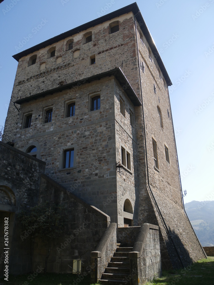 Malaspina Castle in Bobbio. It was built by Malaspina family as a fortress with a massive tower and it was later converted into a residence by Dal Verme family. It dominates the panorama of the Trebbi